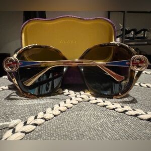 Gucci Sunglasses with Gold and Blue Accents
